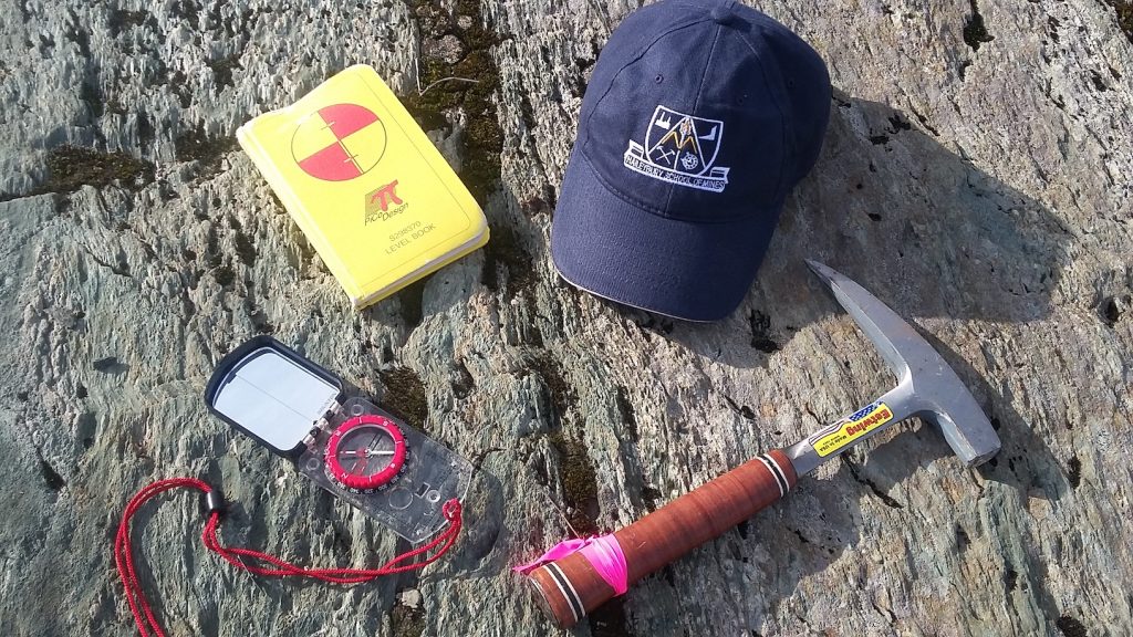 Haileybury School of Mines - tools laying on rocks used for mining