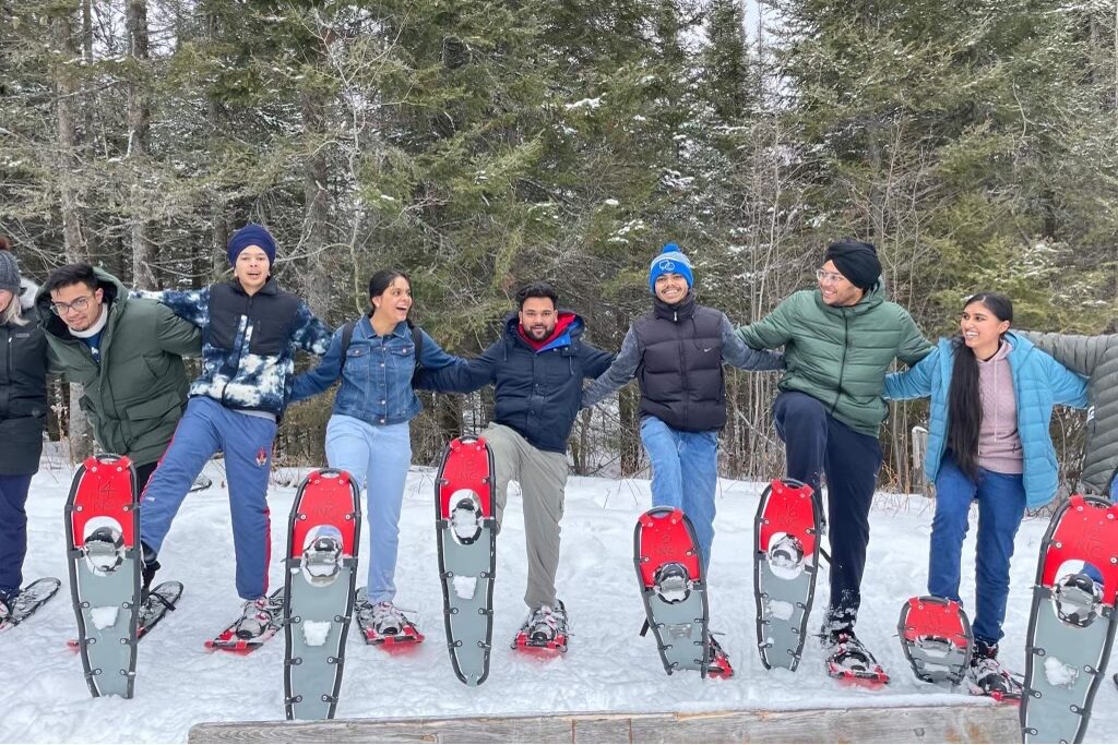 International students snowshoeing fun in winter at Northern College