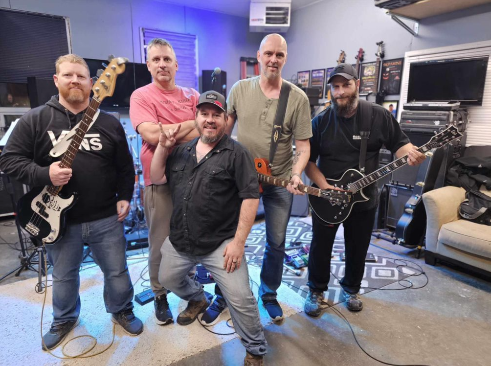 Norm Dwyer, John Olaveson, Jeremy Wilson and their band Miners and Sons