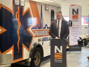 President Mitch Dumas accepts ambulance donation at Northern College Timmins Campus Integrated Emergency Services Complex