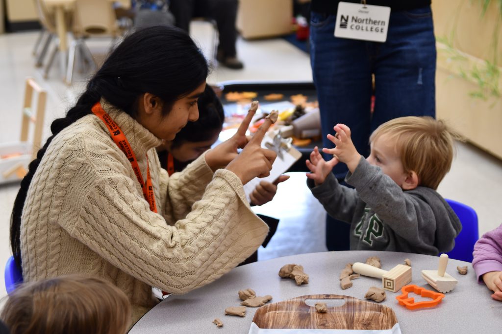 early childhood education student in lab