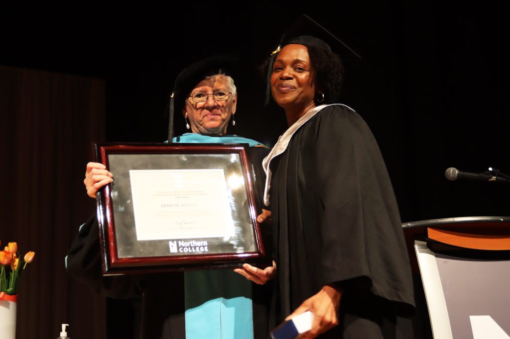 Deniese Morris accepting award from Northern College president
