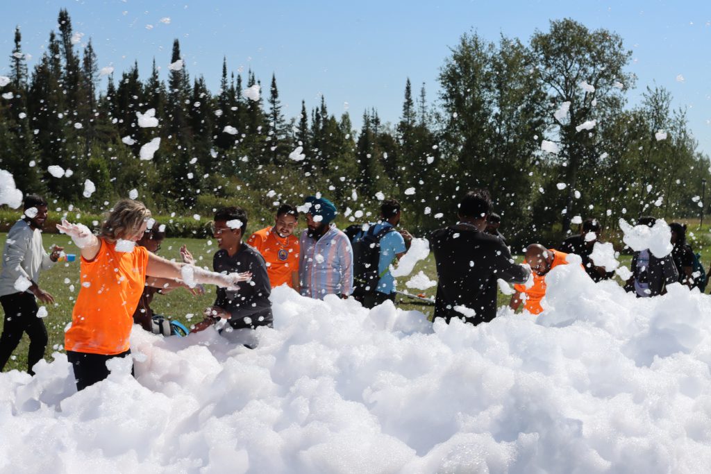 northern college students enjoying outdoor activities during orientation