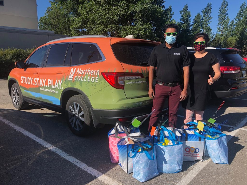 Campus recruiters with gift bags