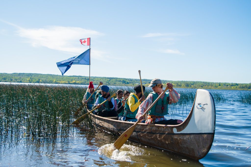 students canoeing